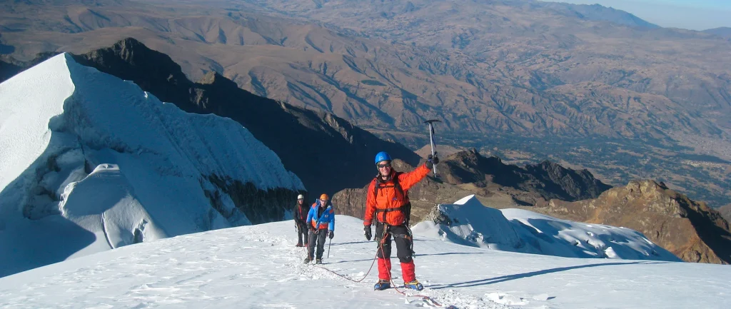 Group of climbers with full gear for an expedition on Vallunaraju