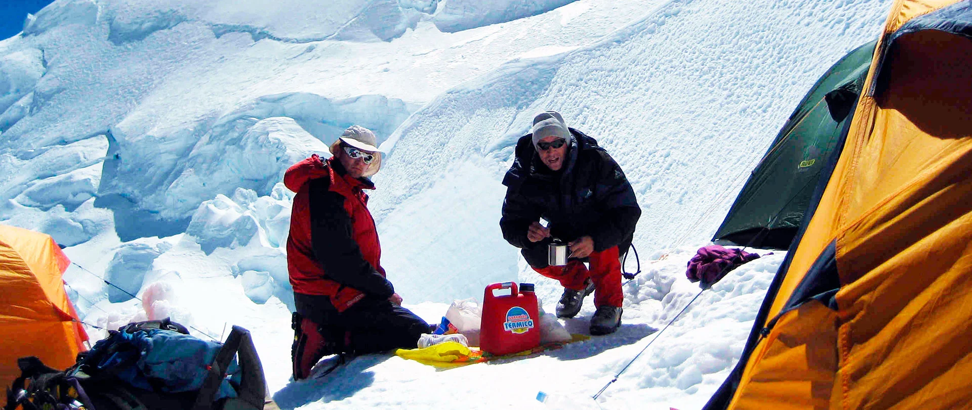 Huascaran peak climb 7 A triumphant mountaineer on the summit of Huascaran Sur (6768m), the highest peak in Peru, after a successful guided expedition.